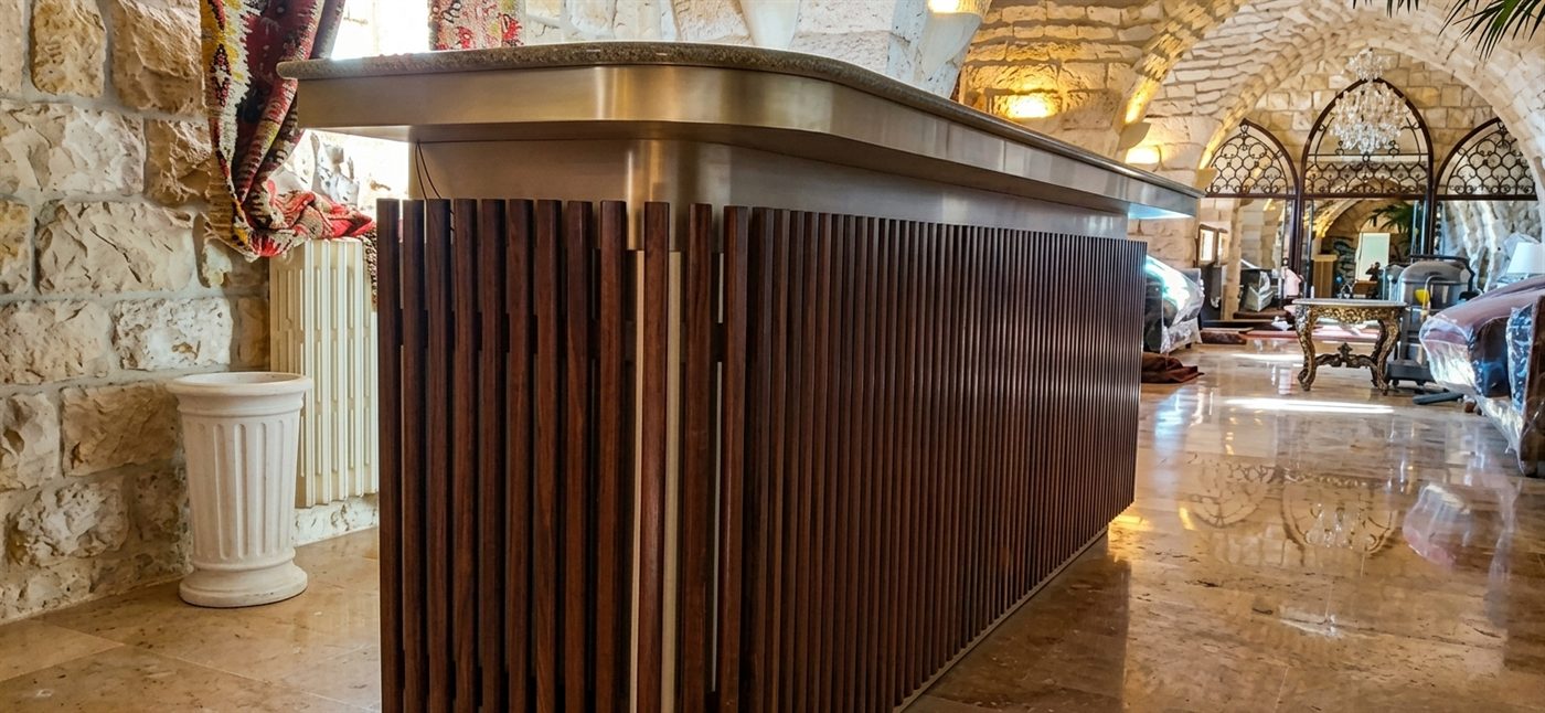 Bar built under a vaulted stone ceiling