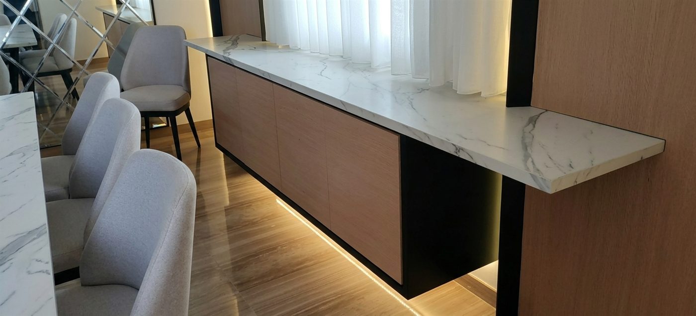 Dining room console in timber with a marble top