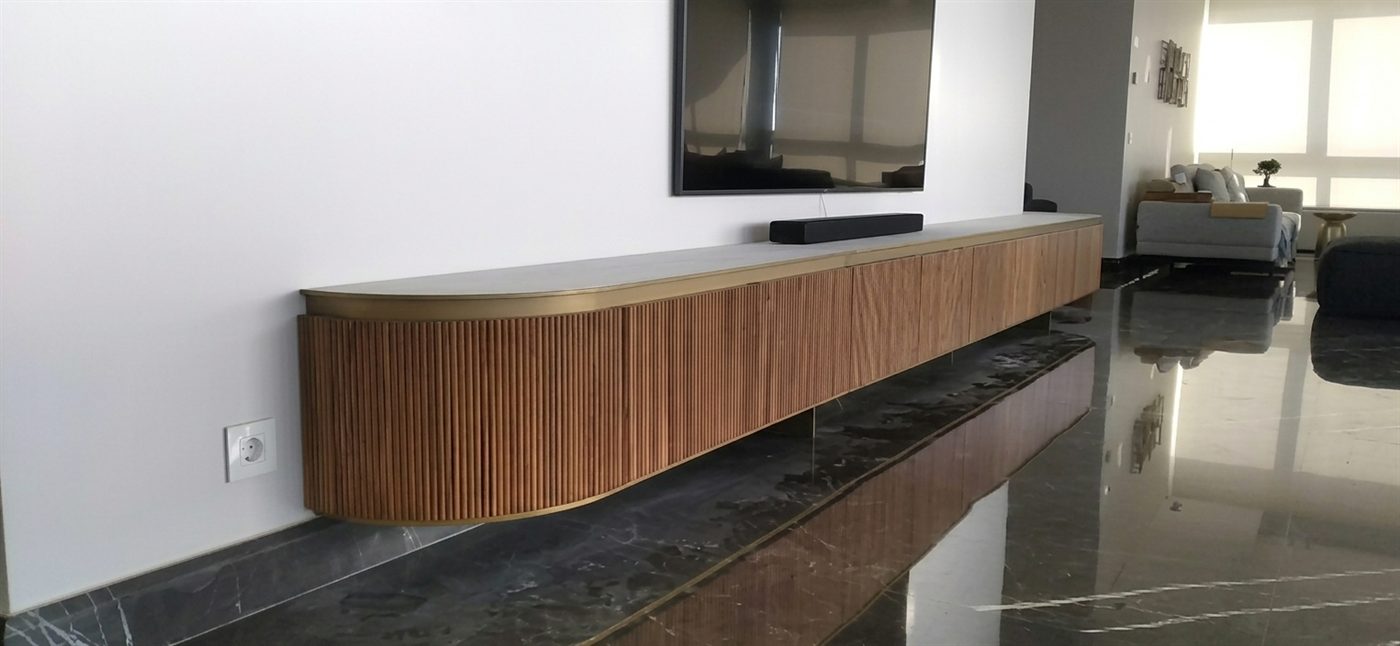 The curved cabinet seen along its length