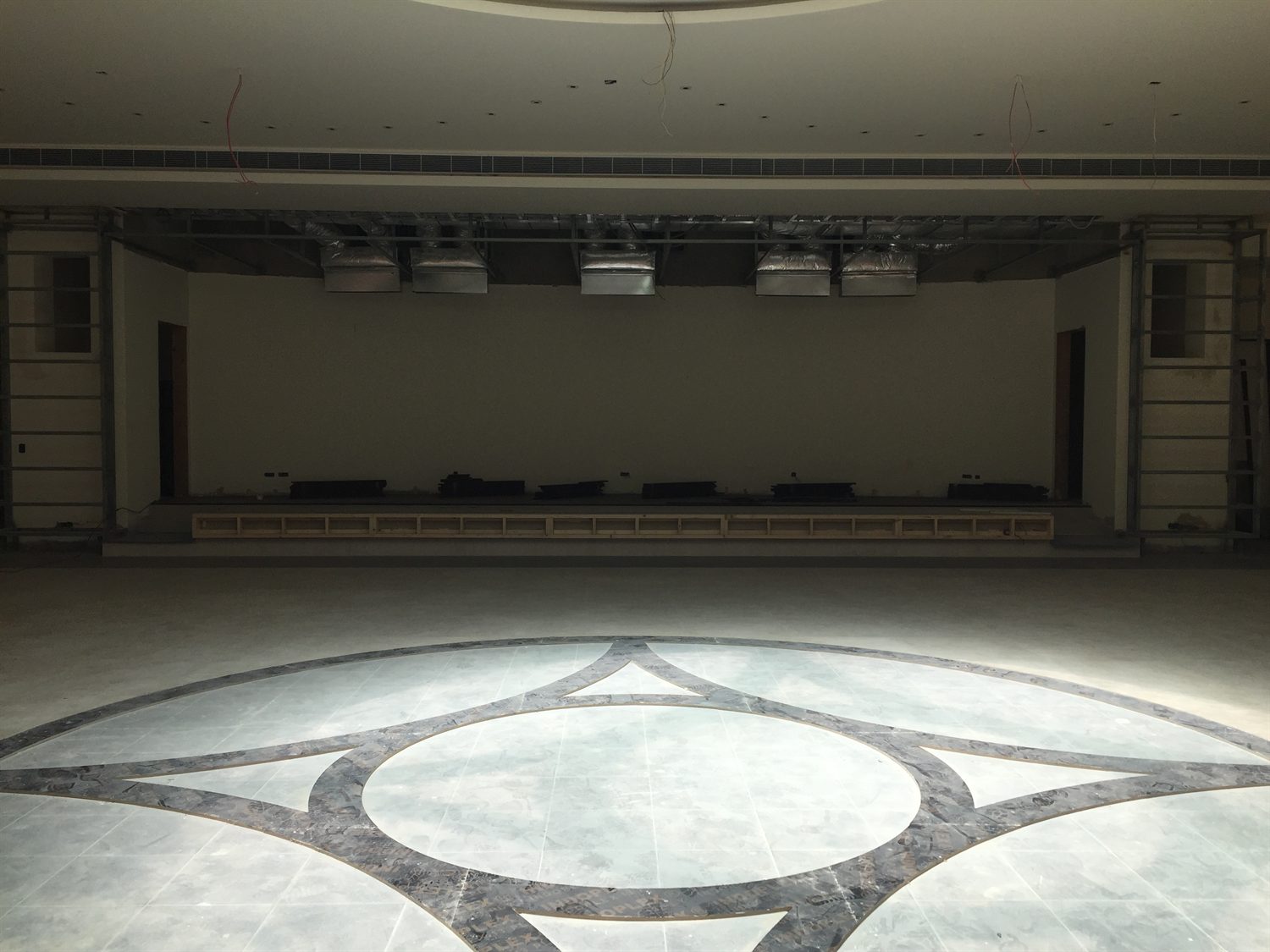 The auditorium empty, showing the inlaid stone floor
